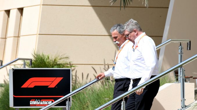 Ross Brawn y Chase Carey